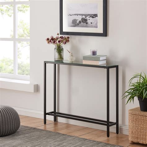 Narrow black console table - Be inspired by a large selection of narrow console tables or thin console tables from UK’s leading retailers – all in one place. Make your space work better for you with narrow console tables or thin console tables to maximise your space. You will find space saving narrow console tables or thin console tables for every budget – from ...
